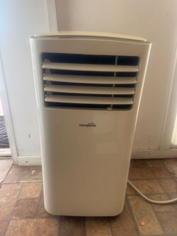 AC UNIT brand new WITH REMOTE ASKING 200 OR BEST OFFER