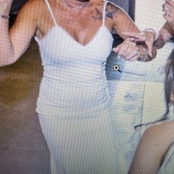 NEW IN PACKAGE WOMEN'S MEDIUM WEDDING DRESS..NOT THE 1 IN THE PICTURE