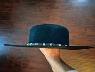custom-made, black felt cowboy hat from the D Bar J Hat Company. D Bar J specializes in high-quality, handmade fur felt hats crafted using traditional