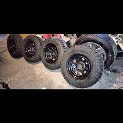 Two Set Of 4 Tires With Rims 
