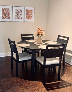 Never used 47” black table with 4 chairs