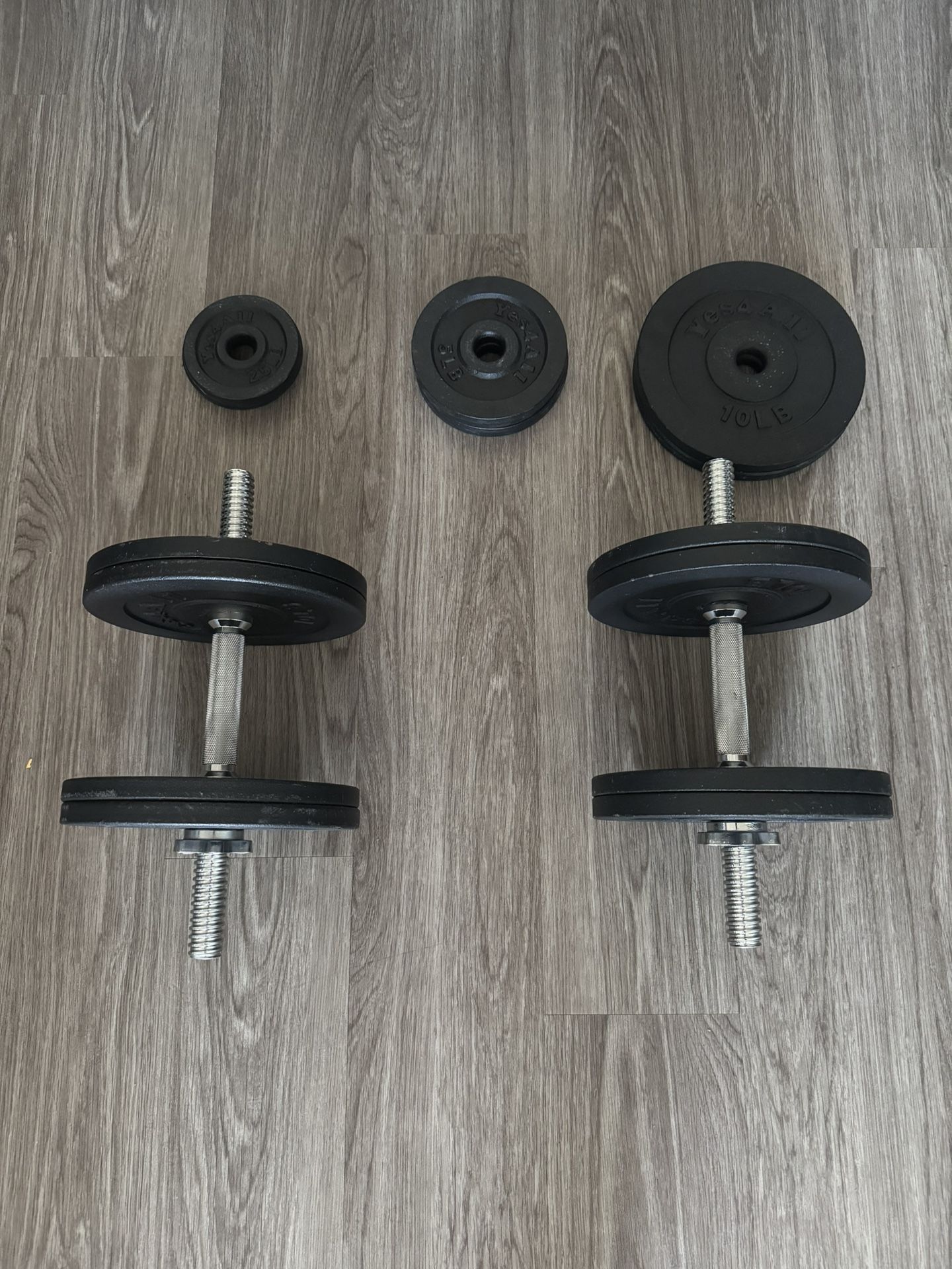 Adjustable Dumbbells with Weight Plates - $50 Firm