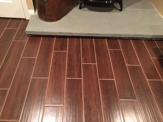 Style Selections Serso Black Walnut 6-in x 24-in Porcelain Wood Look Tile (Common: 6-in x 24-in; Actual: 5.75-in x 23.75-in) Style Selections Serso Black Walnut 6-in x 24-in Porcelain Wood Look Tile (Common: 6-in x 24-in; Actual: 5.75-in x 23.75-in)