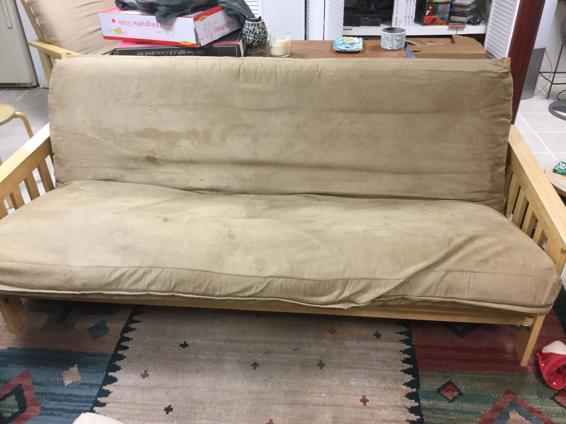 Futon with nice microfiber cover. Camel color $85 not sold separately