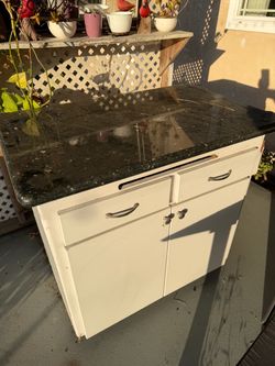 Free cabinet with granite counter top