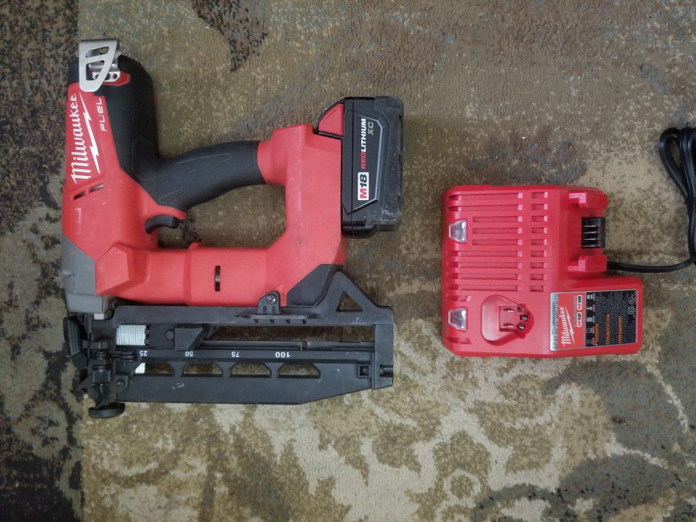 Practically brandnew millwaukee trim gun. With a bigger battery and new charger.