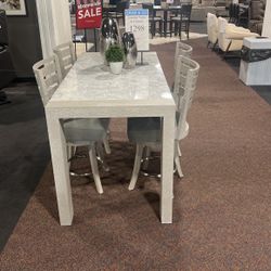 Marble Table with Swivel Stools
