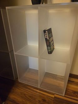 2 hard plastic, durable bookshelves