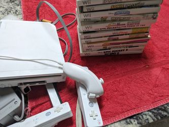Wii $130 15 games wii fit board all cords