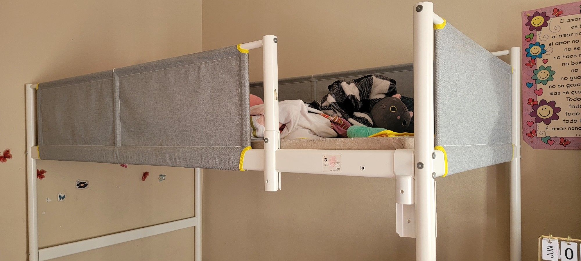 Used bunk bed in excellent condition, white, includes the base but not the mattress.
