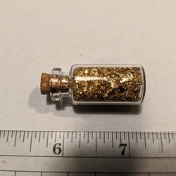 Small Vials Of Gold Flakes