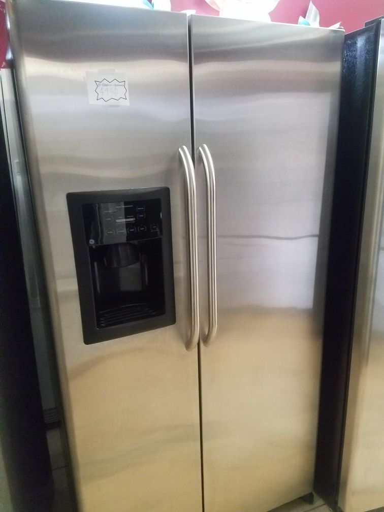 Side by side stainless steel refrigerator