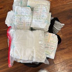 Over 450 Diapers Sizes 1 And 2 Plus Small Swaddle