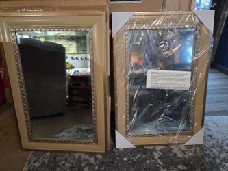 Brand new in box pair of matching mirrors with wooden pewter finish border, $80 for pair