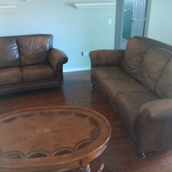 Leather Couch, Loveseat And Coffee Table 