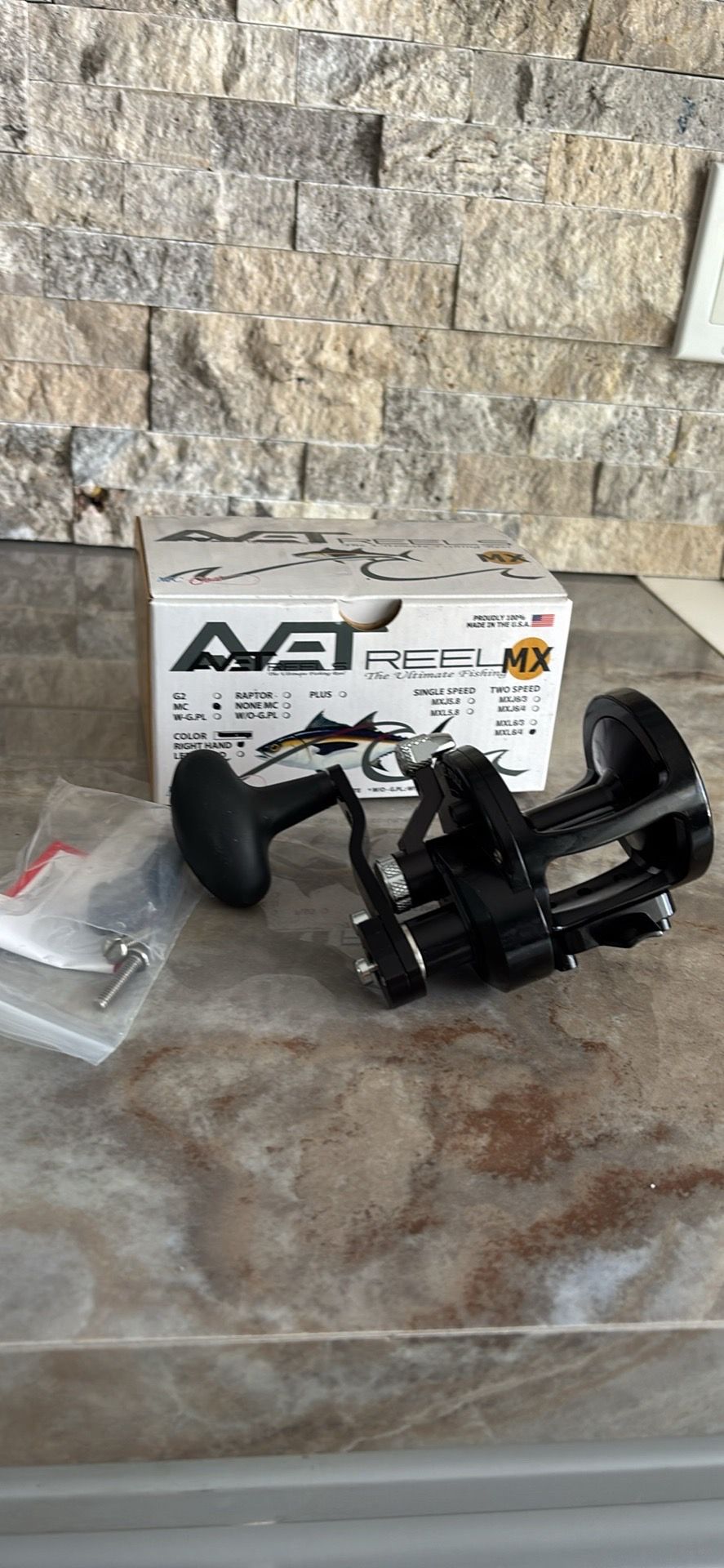 High-quality Avet Reel MXL 6/4 MC fishing reel. Reel is black. It is a right-hand model. It is a single speed reel. Reel comes with original box.