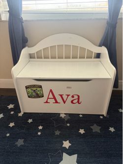 White wooden toy chest bench