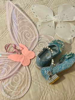 Little girl princess shoes and wings