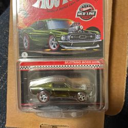This is a Hot Wheels 2022 Red Line Club (RLC) Mustang Boss Hoss die-cast car.  It is a limited edition, with only 30,000 units produced. 