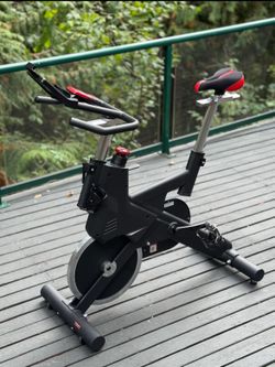 SOLE SB900 Indoor Cycling / Spin Bike – Heavy Duty – SPD Pedals + Tablet Holder