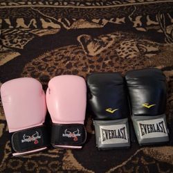 Adults Boxing Gloves For Both $40 Pink 12oz. Black 14oz.