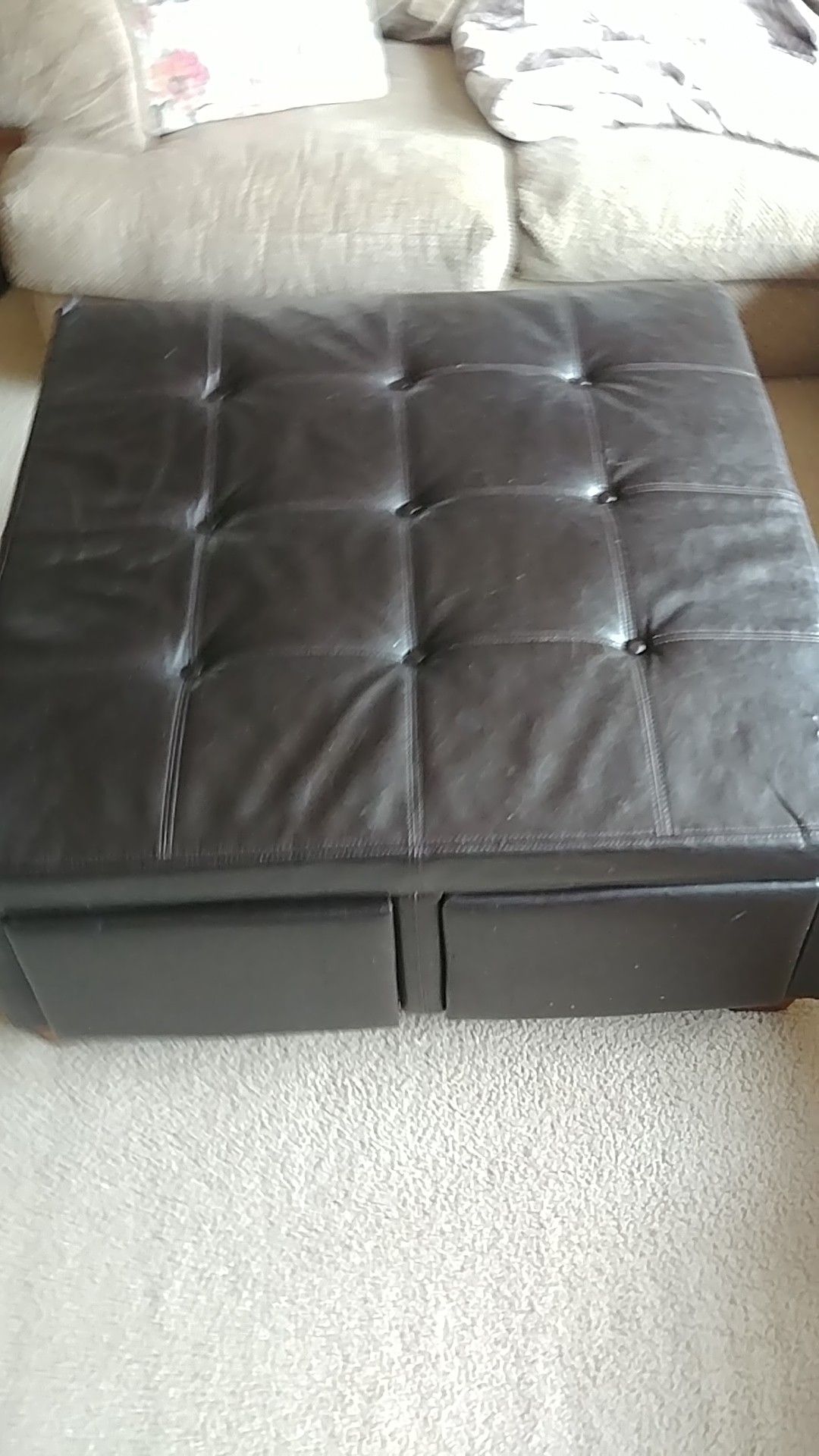 Free: Leather ottoman with 4 storage drawers. Tear on one corner.