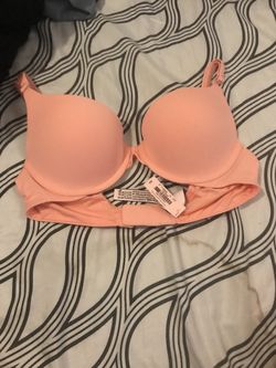 Pink Victoria secret bra with price tag included