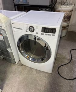 LG front load Electric Dryer, drying machine,  Clean, tested and ready to go. You may test at my location.
60 day warranty on all appliances. (If it s