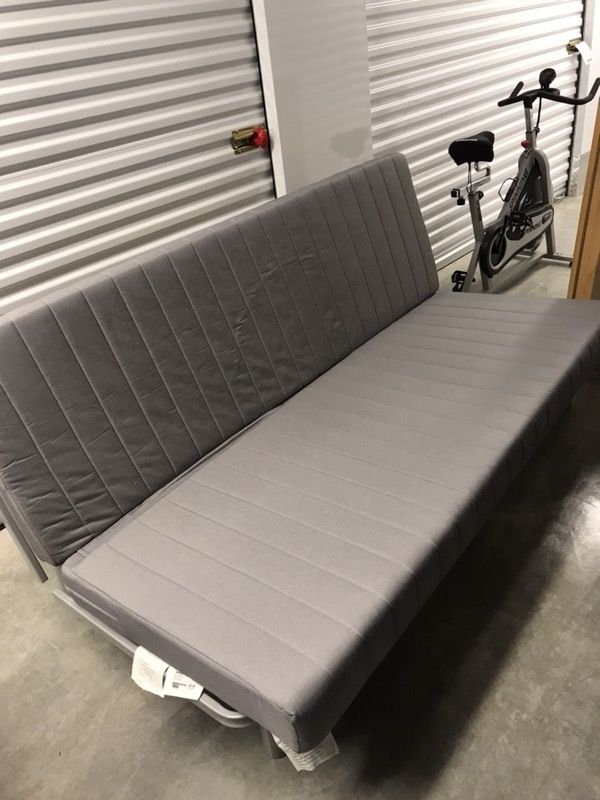SLEEPER SOFA (NYHAMN ikea) with pocket spring mattress & charcoal grey cover