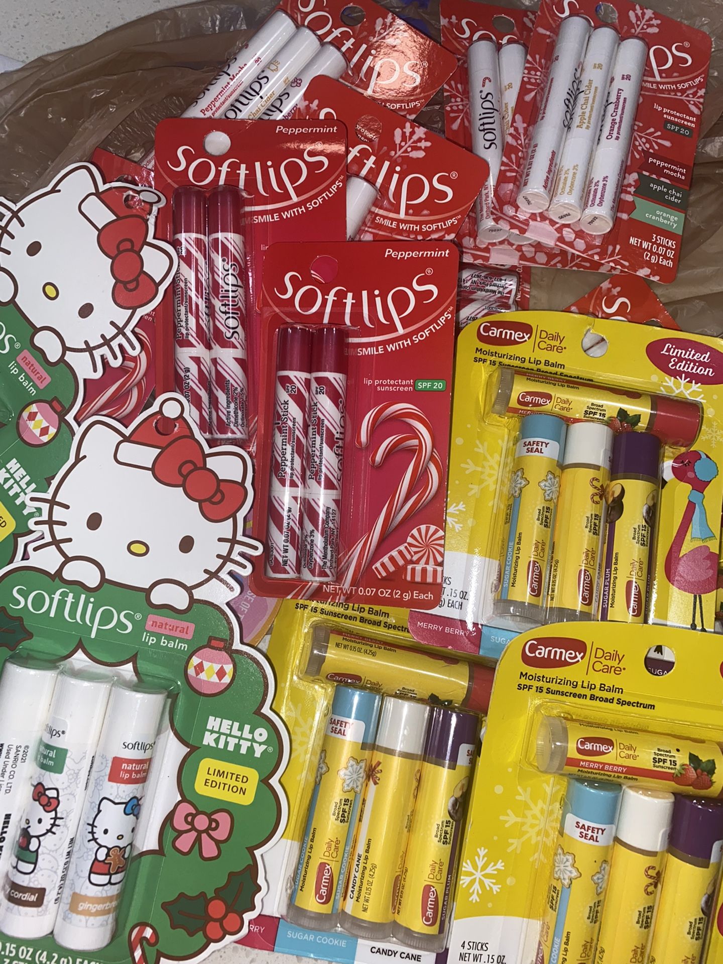 Carmex Daily Care Limited Edition Holiday Lip Balm Sticks with SPF, Sugar Plum, Merry Berry, Candy Cane and Sugar Cookie Flavored Lip Balm Pack, 0.15