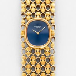 PATEK PHILIPPE YELLOW GOLD ELLIPSE BRACELET WATCH REF. 4148