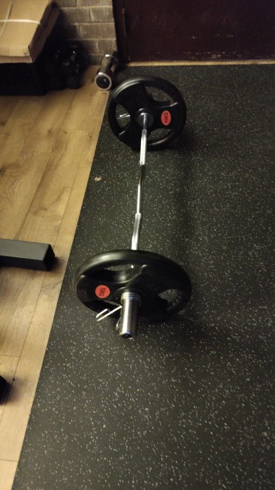 Tri grip olympic weight set with curlbar