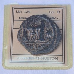 Justinian I "double-struck" follis, a bronze coin from the Byzantine Empire minted in Antioch (Theoupolis) between roughly 529–538 AD.