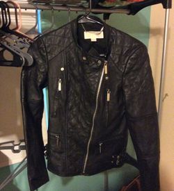 Michael Kors jacket and shoes pair