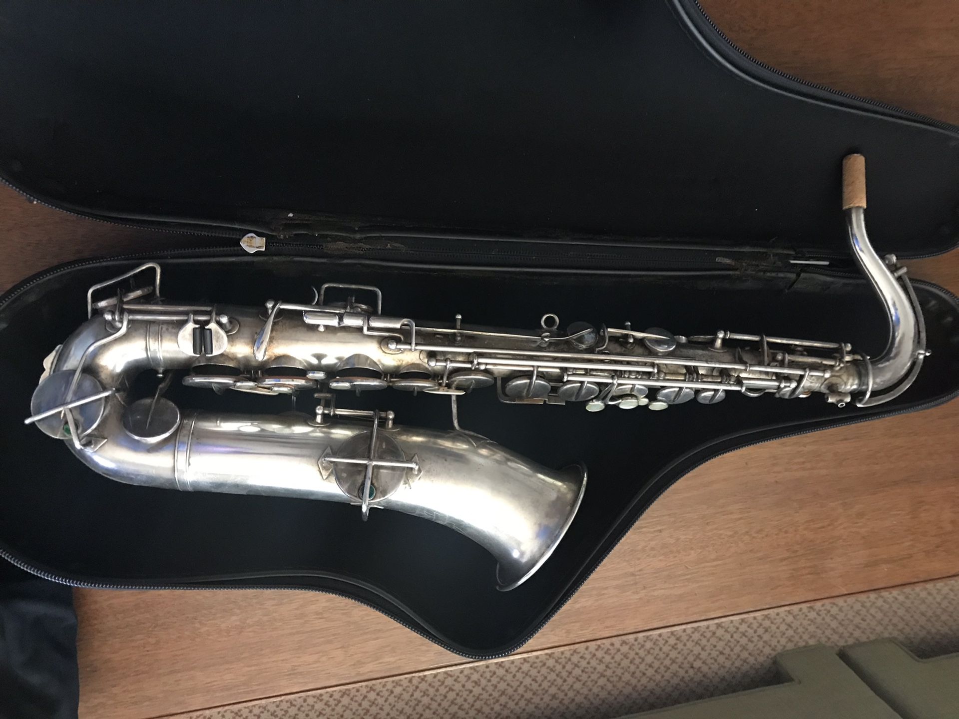 The Buescher elkhart ind saxophone with case