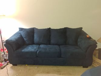 Blue suede couch and chair