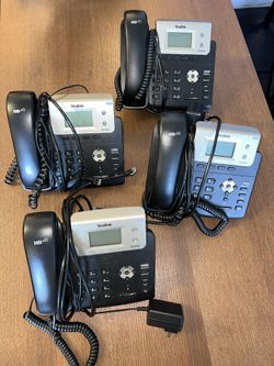 Yealink T21P E2 IP Phone, 2 Lines. 2.3-Inch Graphical Display. Dual-port 10/100 Ethernet, 802.3af PoE