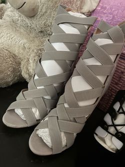 Light grey heels. Black heels