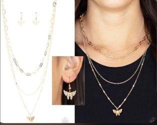 Brand new beautiful butterfly necklace and earrings set ( never used still sealed in package never open ) .