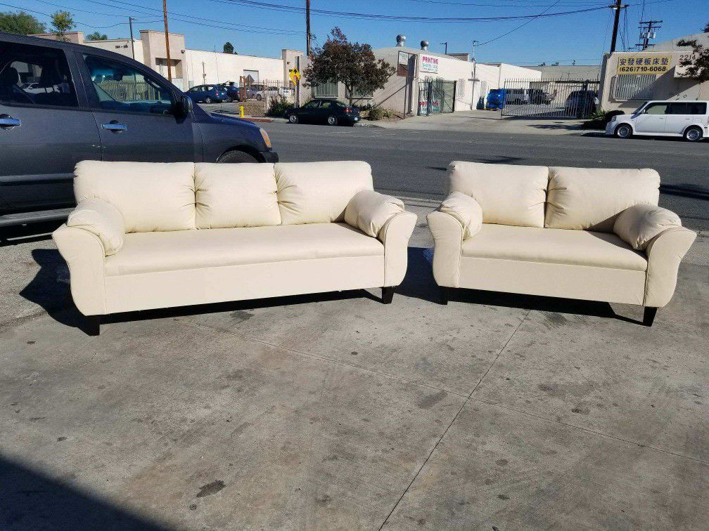 NEW CREAM LEATHER COUCHES