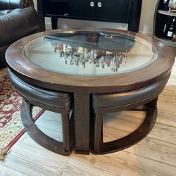 Cocktail table and side tables by signature designed by Ashley Marion