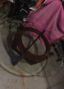 Glass top table 48” diameter