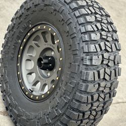 Method MR305 17x8.5 6x135 titanium black lip with 37x12.50R17 Kenda klever M/T tires we finance