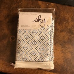 Two standard pillowcases. Brand new never used. From Macy’s department store.