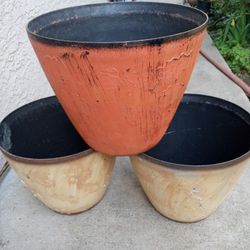  vase para plantas unas  $7 cada una y otras a _8 cada una