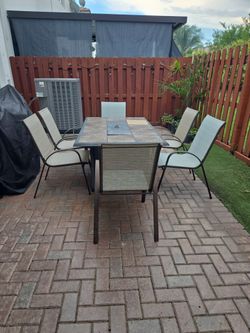Outdoor table with 6 chairs
