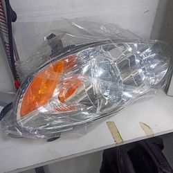 Toyota Corolla 2003-2008 passenger side headlight assembly.