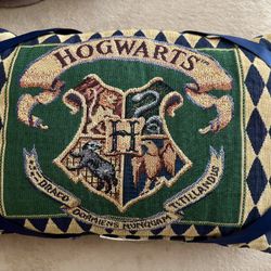 This is a vintage Harry Potter Hogwarts Crest Throw Pillow