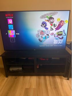 Phillips 65inch TV with TV Stand