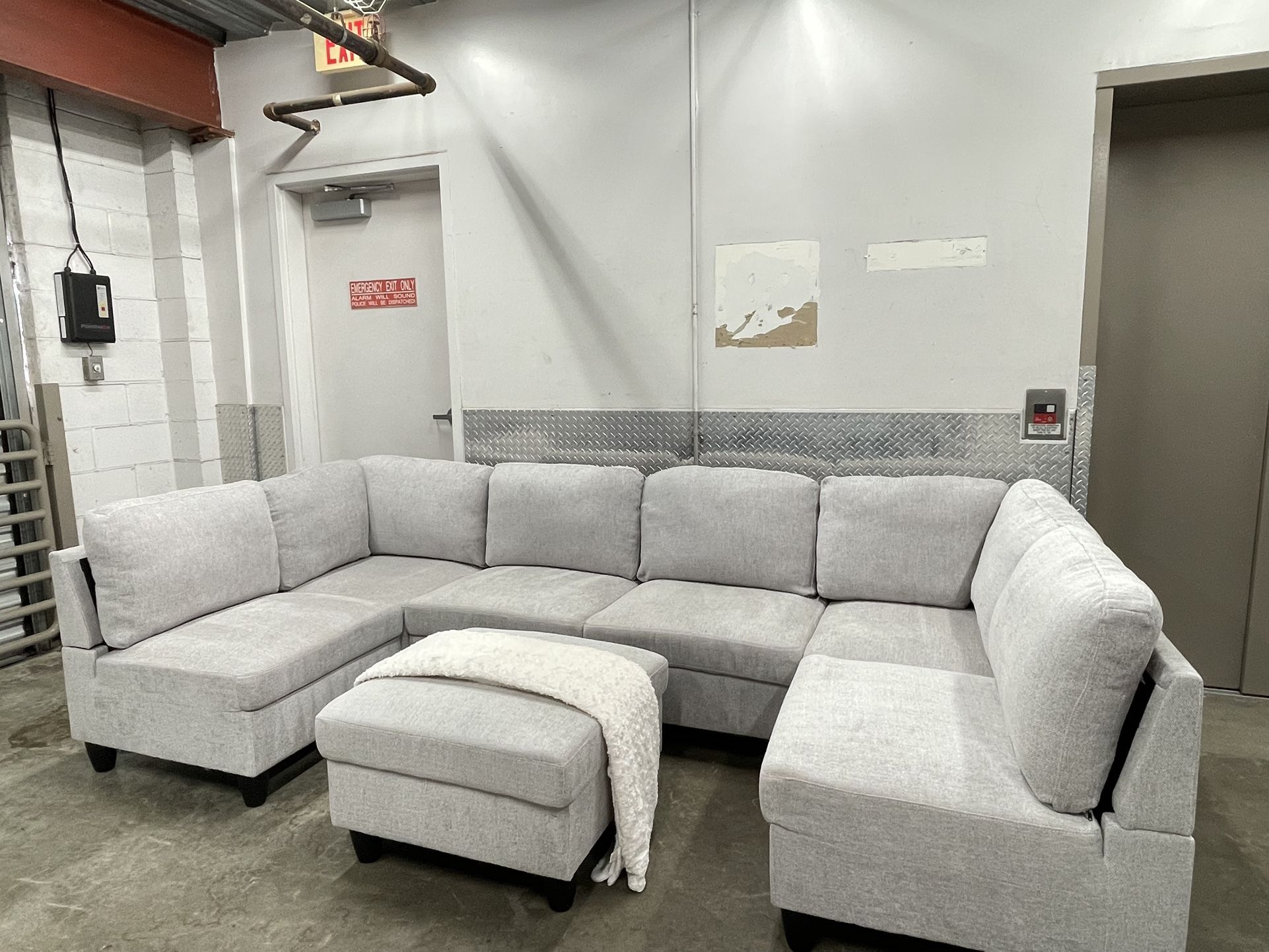 Light Gray Sectional + Ottoman
